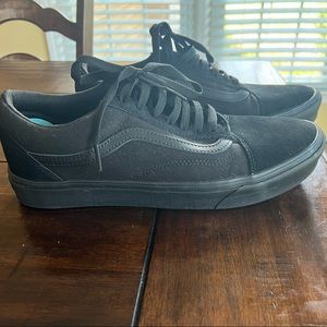 Black on black low top Vans